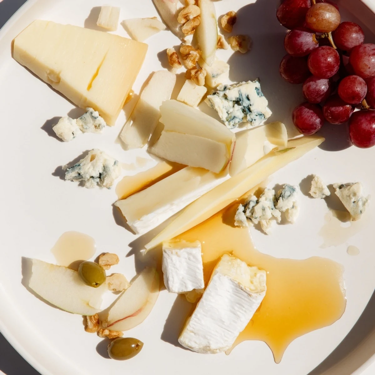 Delectable cheeses, meats, and accompaniments create a vibrant Moonlight Picnic Board perfect for any occasion.