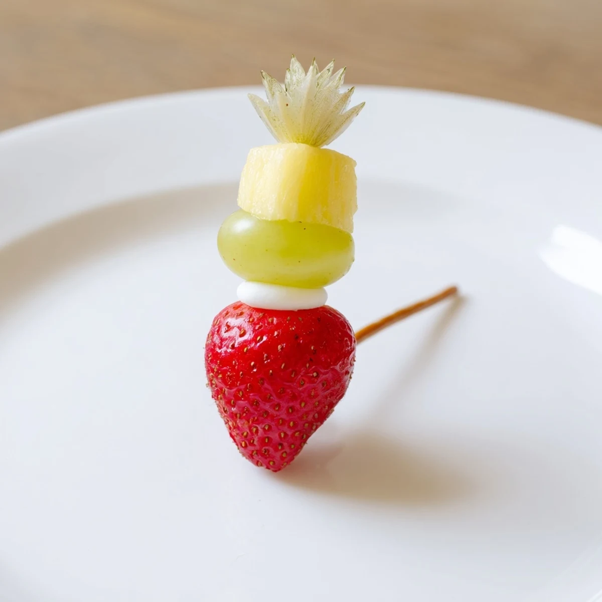 Christmas Light Fruit Skewers: vibrant, colorful fruit arranged on skewers, perfect for a holiday appetizer.