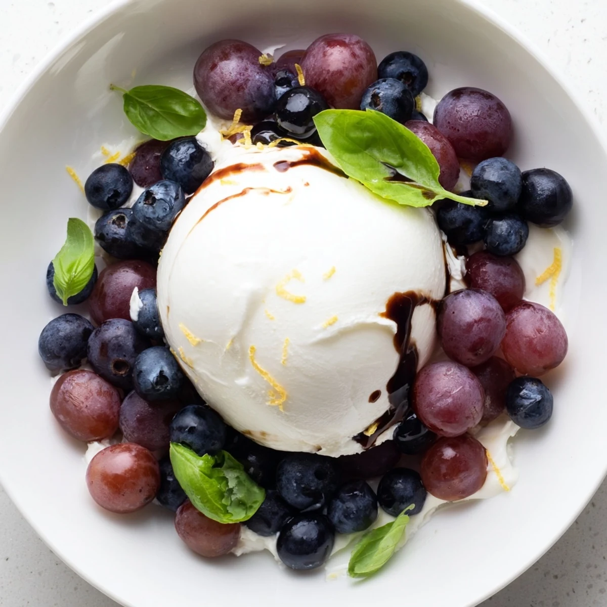 Enjoy the Moonlit Lagoon: a gorgeous salad, burrata in the center, and drizzled with glaze.