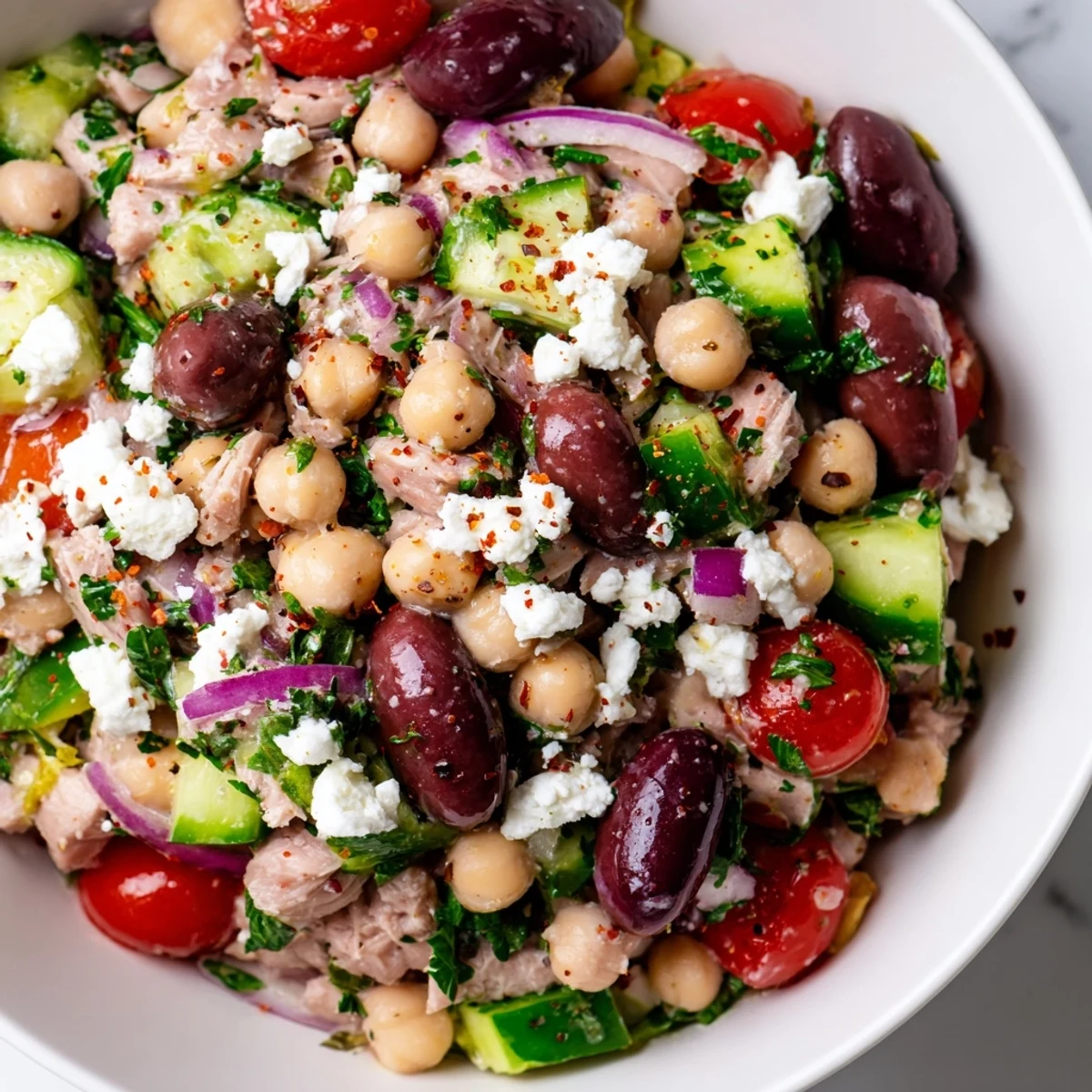 Enjoy this refreshing Tuna Chickpea Salad, a perfectly seasoned and protein-rich bowl of healthy goodness.