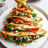 Crispy Air Fryer Christmas Tree Veggie Tortilla Wraps showcase colorful veggies, perfect for a festive appetizer.
