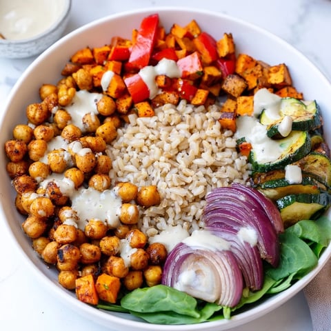 Crispy roasted chickpeas and colorful vegetables star in this Roasted Chickpea Buddha Bowl.