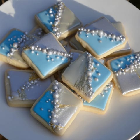 A close-up of a glamorous Engagement Ring Diamond Dessert Tray, showcasing silver and edible gems.
