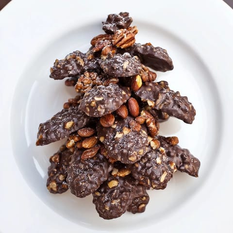 These homemade pinecone chocolate nut clusters showcase crunchy nuts and rich chocolate, a beautiful woodland-themed treat.