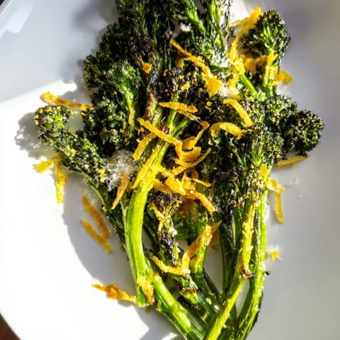 Earthy and bright: this Charred Broccolini Salad features tender broccolini, lemon zest, and toasted pine nuts.