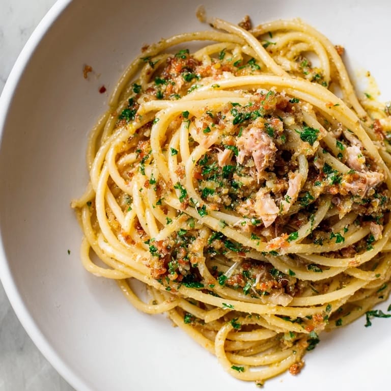 Golden, glistening Simple Garlic Butter Bucatini, perfectly coated with garlic butter sauce and chicken.