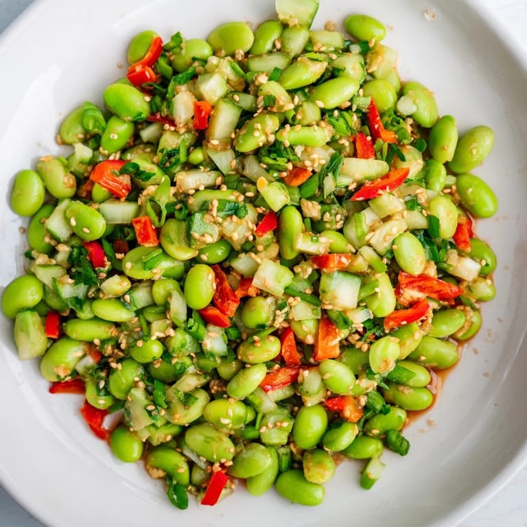 Chilled edamame salad, bursting with fresh flavors, perfect as a light lunch or side.