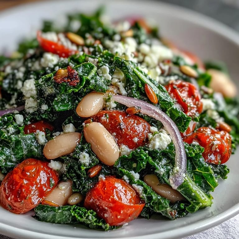 Creamy white bean and kale salad with bright lemon-garlic dressing, ready to serve.