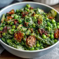 Vibrant shaved asparagus and pea salad with lemon dressing, fresh spring flavors in every bite